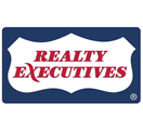 Realty Executives/The Woodland logo