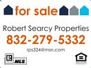 Robert Searcy Properties logo