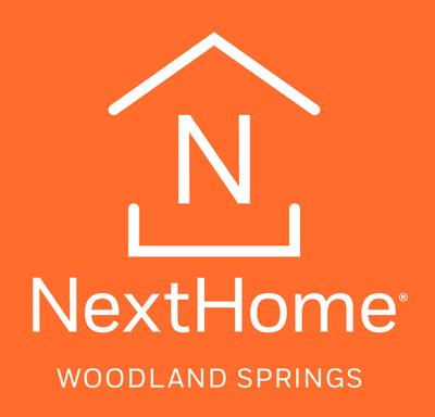 NextHome Woodland Springs logo